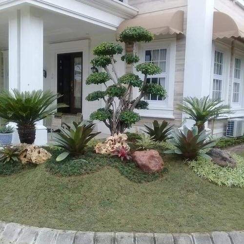 Pembuatan taman Malang dengan tanaman hias dan elemen landscape